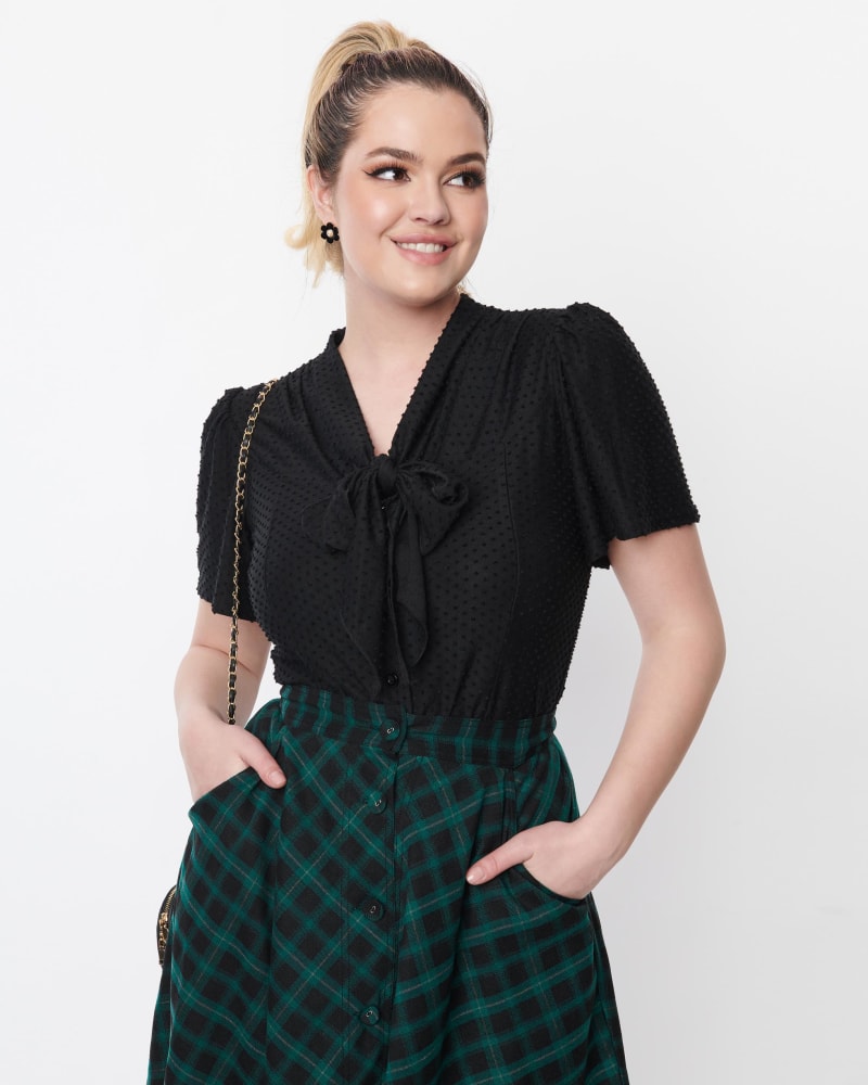 Front of a model wearing a size XL Unique Vintage Black Clip Dot Tie Collar Top in Black Clipdot by Unique Vintage. | dia_product_style_image_id:304949